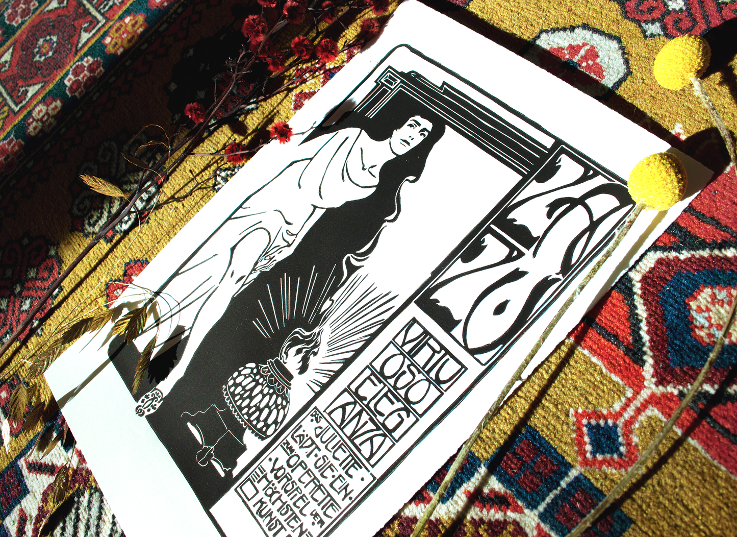 A lino print of an exclusive invitation of the opera to an exclusive concert of Zazu ind black.